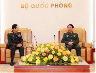 Vietnam, Laos enhance defence cooperation